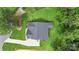 Drone shot showcasing the home's roof, surrounding landscaping, and paved driveway at 3222 Player Ct, Salisbury, NC 28144