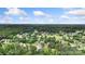 Overhead angle of real estate in a golf community surrounded by lush, mature trees at 3222 Player Ct, Salisbury, NC 28144