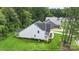 Aerial view of the home showcasing its architectural design and lush, green surroundings at 3222 Player Ct, Salisbury, NC 28144