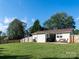 Expansive backyard featuring a patio, fence, and well-maintained lawn at 327 Downing St, Troutman, NC 28166