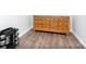 Neutral-toned bedroom displaying classic wood furniture and complemented by a modern gray hardwood floor at 327 Downing St, Troutman, NC 28166
