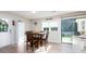 Inviting dining area with table and chairs near sliding glass doors, perfect for Gathering meals at 327 Downing St, Troutman, NC 28166