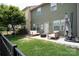 Inviting backyard featuring a cozy patio set, perfect for outdoor relaxation and entertainment at 3537 Hornets Nest Way # 206, Charlotte, NC 28208