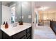 Well-lit bathroom featuring a modern sink and faucet, complemented by neutral wall colors and decor at 3537 Hornets Nest Way # 206, Charlotte, NC 28208