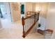 Upstairs hallway with railing, plush carpeting, and access to other rooms at 3537 Hornets Nest Way # 206, Charlotte, NC 28208
