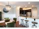 Modern kitchen featuring dark cabinets, stainless steel appliances, and granite countertops at 3537 Hornets Nest Way # 206, Charlotte, NC 28208