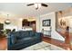 Open living space with hardwood floors and plenty of seating at 3537 Hornets Nest Way # 206, Charlotte, NC 28208