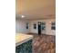 A large living room offers hardwood floors, natural light and updated fixture at 379 Sharpe St, Mooresville, NC 28115