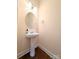 A pedestal sink in a half-bathroom exudes a clean and minimalist design aesthetic at 408 Presidio Dr, Rock Hill, SC 29732