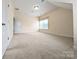 Large bedroom with neutral carpet, large windows, and natural lighting at 408 Presidio Dr, Rock Hill, SC 29732