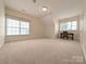 Spacious, light-filled bedroom with neutral carpeting, large windows, and ample natural light at 408 Presidio Dr, Rock Hill, SC 29732