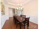 Formal dining room with tray ceiling, crown molding, and ample seating at 408 Presidio Dr, Rock Hill, SC 29732