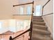 Two-story foyer with wooden staircase, hardwood floors, and wainscoting at 408 Presidio Dr, Rock Hill, SC 29732