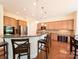 Spacious kitchen with wood floors, stainless steel appliances, granite countertops, and a breakfast bar at 408 Presidio Dr, Rock Hill, SC 29732