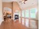 Spacious living area with fireplace and expansive windows offering plenty of natural light at 408 Presidio Dr, Rock Hill, SC 29732