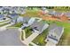 Aerial view highlighting landscaped yards, mature trees, and neighborhood layout at 410 Apex Cir, Shelby, NC 28152
