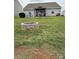 Spacious backyard with fire pit and a gazebo at 410 Apex Cir, Shelby, NC 28152