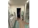 Well-lit bathroom featuring a walk-in shower and a spacious vanity with granite countertops at 410 Apex Cir, Shelby, NC 28152