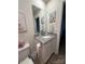 Bathroom boasts granite countertops, framed mirror, and lovely decor at 410 Apex Cir, Shelby, NC 28152