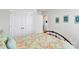 Bedroom showcasing a wrought iron bed with colorful paisley bedding, white trim and art at 410 Apex Cir, Shelby, NC 28152