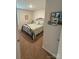 Bedroom with a black iron bed and decorative pictures on the wall at 410 Apex Cir, Shelby, NC 28152
