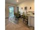 Cozy dining area with sliding glass doors and views of the backyard at 410 Apex Cir, Shelby, NC 28152