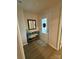 This entryway features wood-look flooring and a unique entryway table at 410 Apex Cir, Shelby, NC 28152