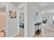 Bright hallway with views to a bedroom, bathroom, living room, and dining area at 410 Apex Cir, Shelby, NC 28152