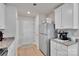 Functional kitchen with stainless steel appliances and ample cabinet space at 410 Apex Cir, Shelby, NC 28152