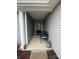 Welcoming covered porch featuring a bench, decorative plants, and stylish accents at 410 Apex Cir, Shelby, NC 28152