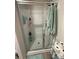 Bright bathroom featuring a standing shower with glass door at 410 Apex Cir, Shelby, NC 28152