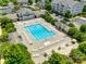 Aerial view of a sparkling community pool and sundeck, creating the perfect space to enjoy resort-style living at 4107 Park South Station Blvd, Charlotte, NC 28210