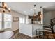 Modern kitchen with granite countertops, stainless steel appliances, and dark cabinets at 4107 Park South Station Blvd, Charlotte, NC 28210