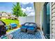 Cozy patio with outdoor seating and a view of the fenced backyard at 4107 Park South Station Blvd, Charlotte, NC 28210