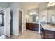 Elegant bathroom featuring double vanities, granite countertops, and separate toilet area, providing comfort and privacy at 4220 Thames Cir, Fort Mill, SC 29715