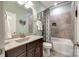 Bathroom featuring tiled shower and tub, decorative shower curtain, and solid surface vanity at 4220 Thames Cir, Fort Mill, SC 29715