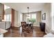 Inviting dining room with hardwood floors, natural light, and comfortable seating for Gathering meals at 4220 Thames Cir, Fort Mill, SC 29715