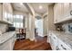 Charming home office with built-in desk, cabinets, and hardwood floors for a productive workspace at 4220 Thames Cir, Fort Mill, SC 29715