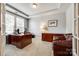 Spacious home office featuring a large desk, leather chair, and ample natural light at 4220 Thames Cir, Fort Mill, SC 29715