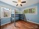 Bright blue bedroom showcases a modern bunk bed and natural light at 427 E 12Th Ave, Gastonia, NC 28054
