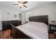 This bedroom features ample storage, a closet, and a comfortable queen-sized bed at 427 E 12Th Ave, Gastonia, NC 28054