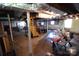 Unfinished basement with block walls and stairs leading to the floor above at 506 Linwood Rd, Gastonia, NC 28052