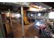 Spacious unfinished basement featuring block walls and a staircase leading to the floor above at 506 Linwood Rd, Gastonia, NC 28052