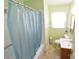 Functional bathroom with a tub/shower combo and classic fixtures in a modest space at 506 Linwood Rd, Gastonia, NC 28052