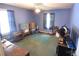 Blue bedroom with natural light, neutral trim, and standard closet at 506 Linwood Rd, Gastonia, NC 28052
