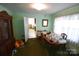 Traditional dining room with hardwood table, wood trim, and classic decor at 506 Linwood Rd, Gastonia, NC 28052
