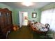 Traditional dining room with wood table and chairs plus a decorative china cabinet at 506 Linwood Rd, Gastonia, NC 28052