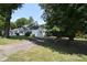 Charming single-story home with mature trees and a spacious front yard at 506 Linwood Rd, Gastonia, NC 28052