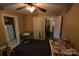 Large living room with views into the kitchen and dining room, and a ceiling fan at 506 Linwood Rd, Gastonia, NC 28052