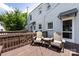 Comfortable back porch with two Adirondack chairs overlooking the back of the home at 528 Wakefield Dr # A, Charlotte, NC 28209